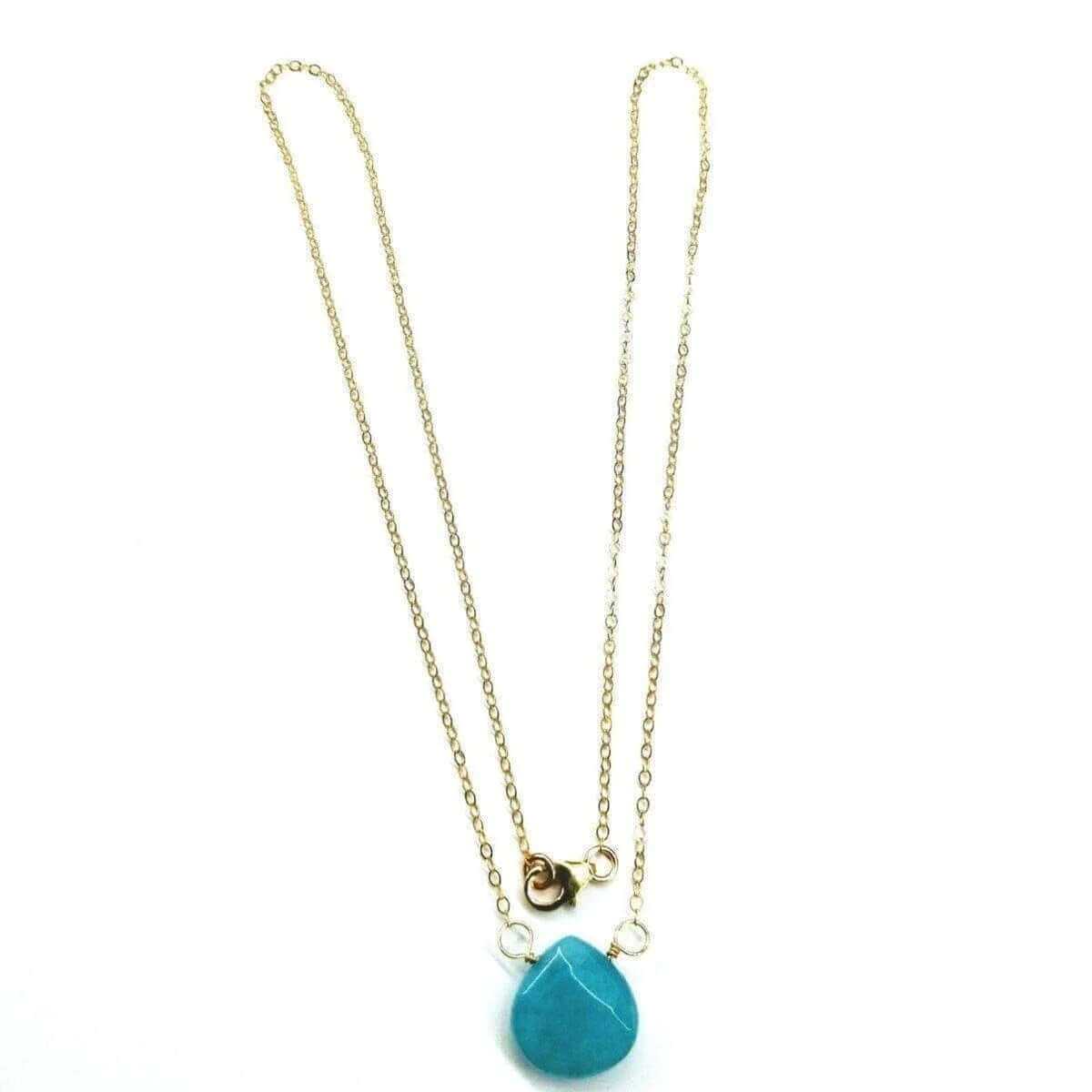 14Kt handcrafted gold necklace featuring a stunning aqua jade gemstone drop on a delicate chain.