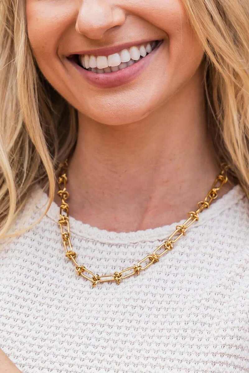 18k stainless steel gold plated barbed wire necklace on woman