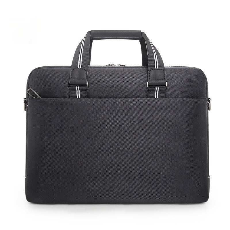 Large capacity men's laptop bag in black Oxford cloth with soft handles and zipper closure.
