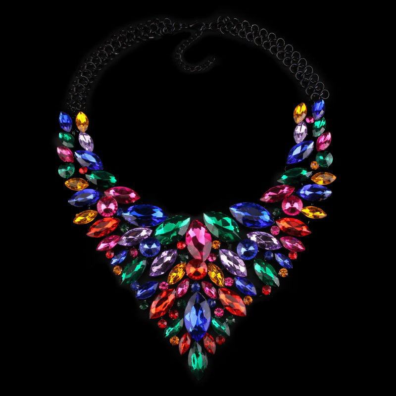Colorful diamond-studded alloy necklace with water drop shape design on black background