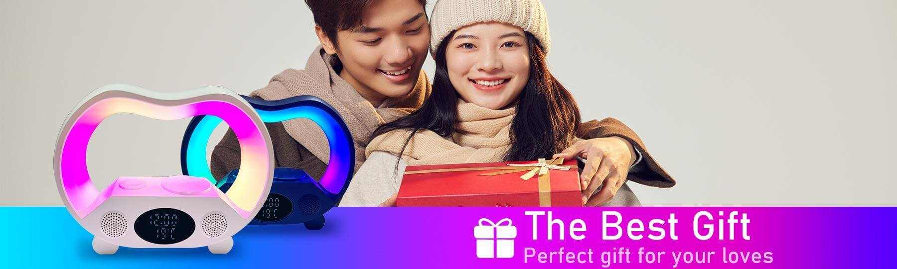 Couple celebrating with a colorful wireless charging night light and gifts, showcasing a perfect home decor gift option.