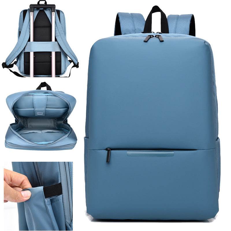 Large-capacity business laptop backpack in light blue color with multiple compartments and padded straps.