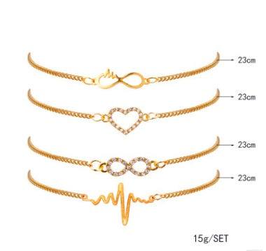Set of 4 CZ Heart Gold Crystal plated gold bracelets with heart and infinity designs, 23cm length each