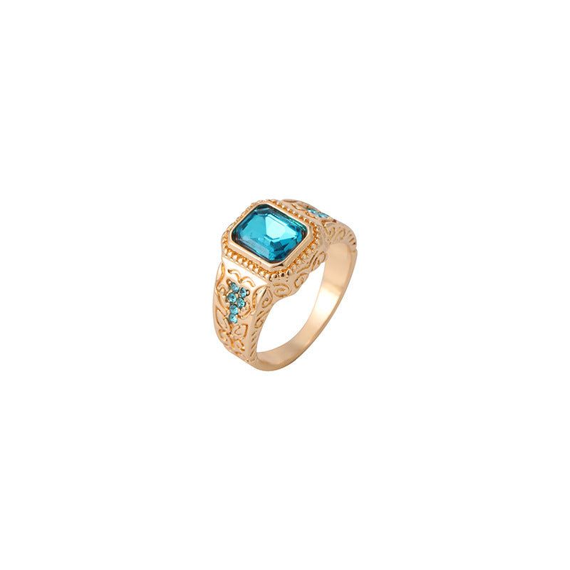 gold alloy plating ring with ice blue rhinestone geometric design