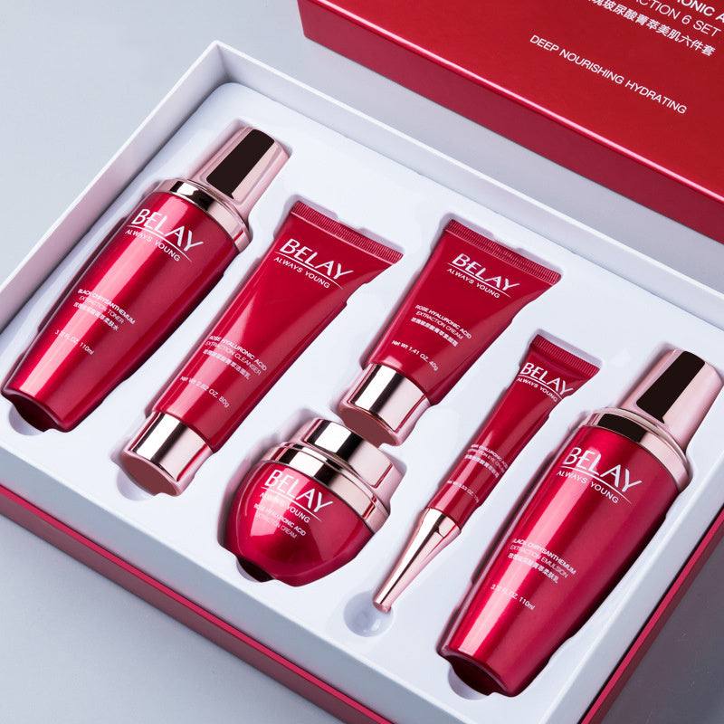 Anti-aging professional skin care bundle with six red cosmetic products in a box
