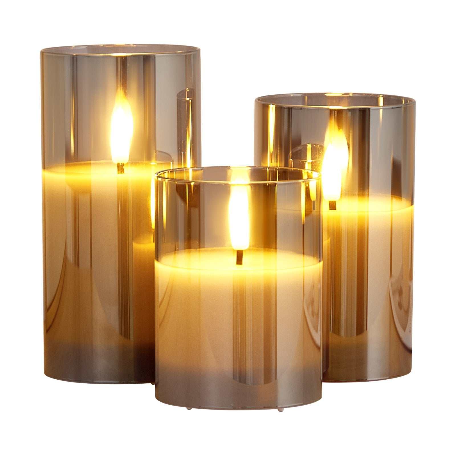 battery operated flameless LED candles in three sizes with a warm glow, perfect for home decor and ambiance.
