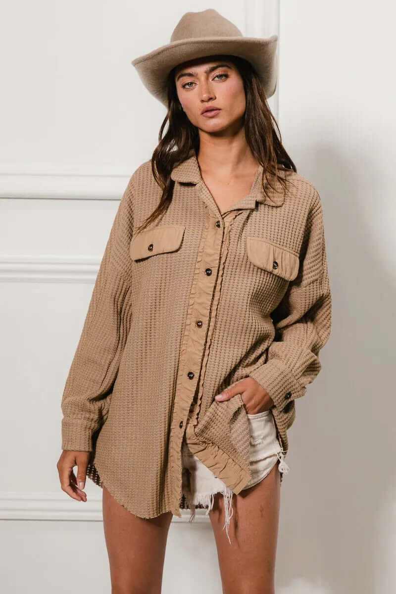 Bibi Heavy Waffle Oversized Shacket in beige, styled with a hat and shorts for a trendy fall outfit.