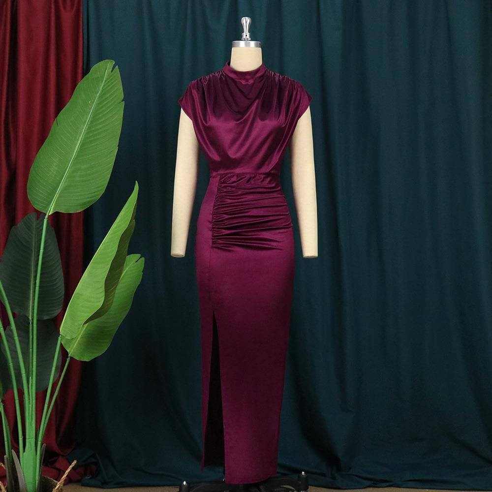 Elegant burgundy plus size dress in matel silk, featuring a sleek design and side slit, perfect for summer outings.