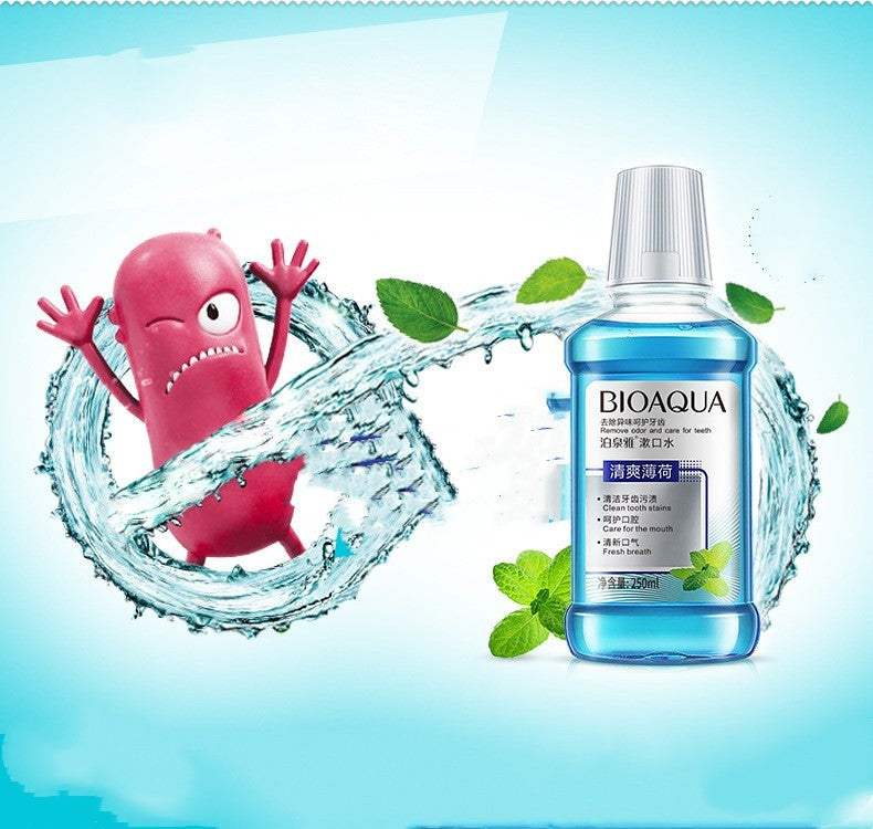 Quick Cleanse Pocket-Sized mouthwash bottle with mint leaves and cartoon germ illustration