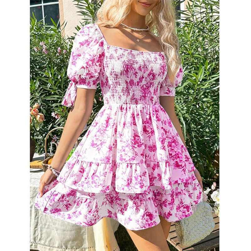 Women's puff sleeve square neck smocked mini dress with boho floral print and ruffle hem, perfect for summer.