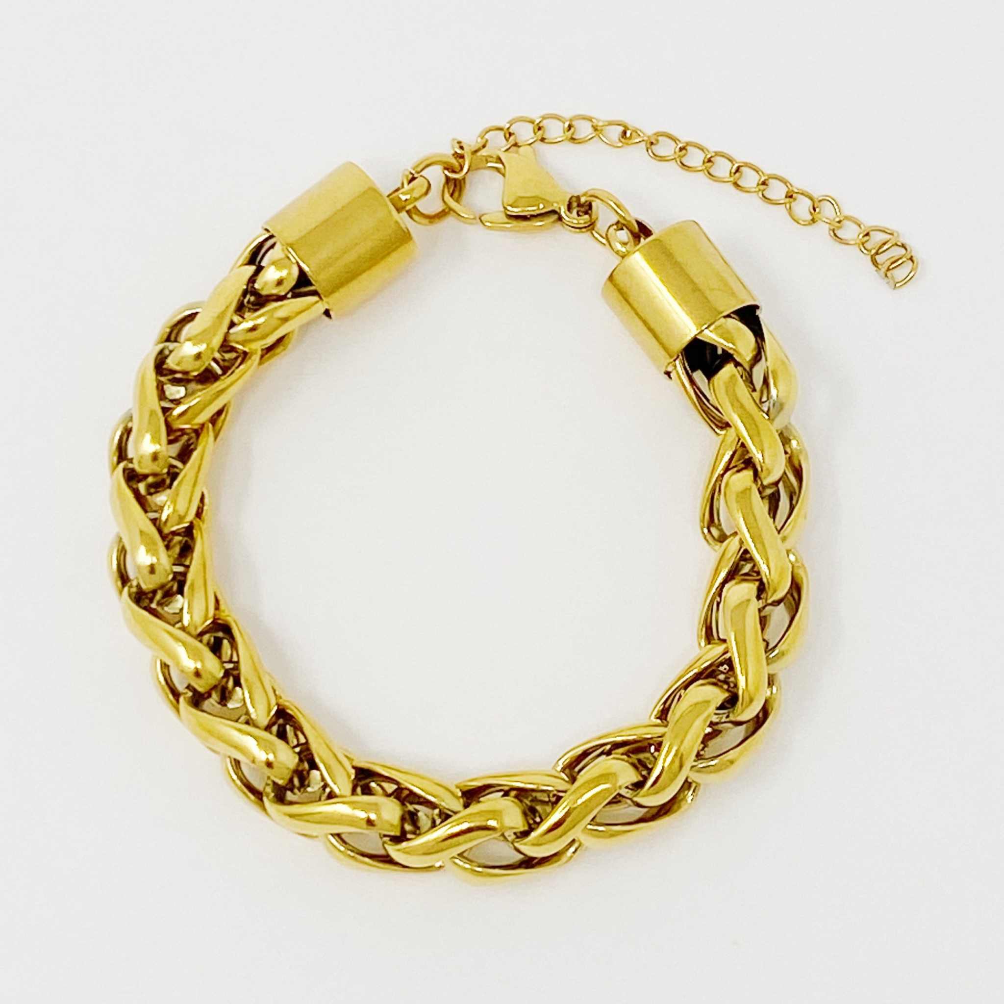 Bold and edgy fashion chain bracelet in 18k gold plated stainless steel, 6 inch length with extender, water resistant.