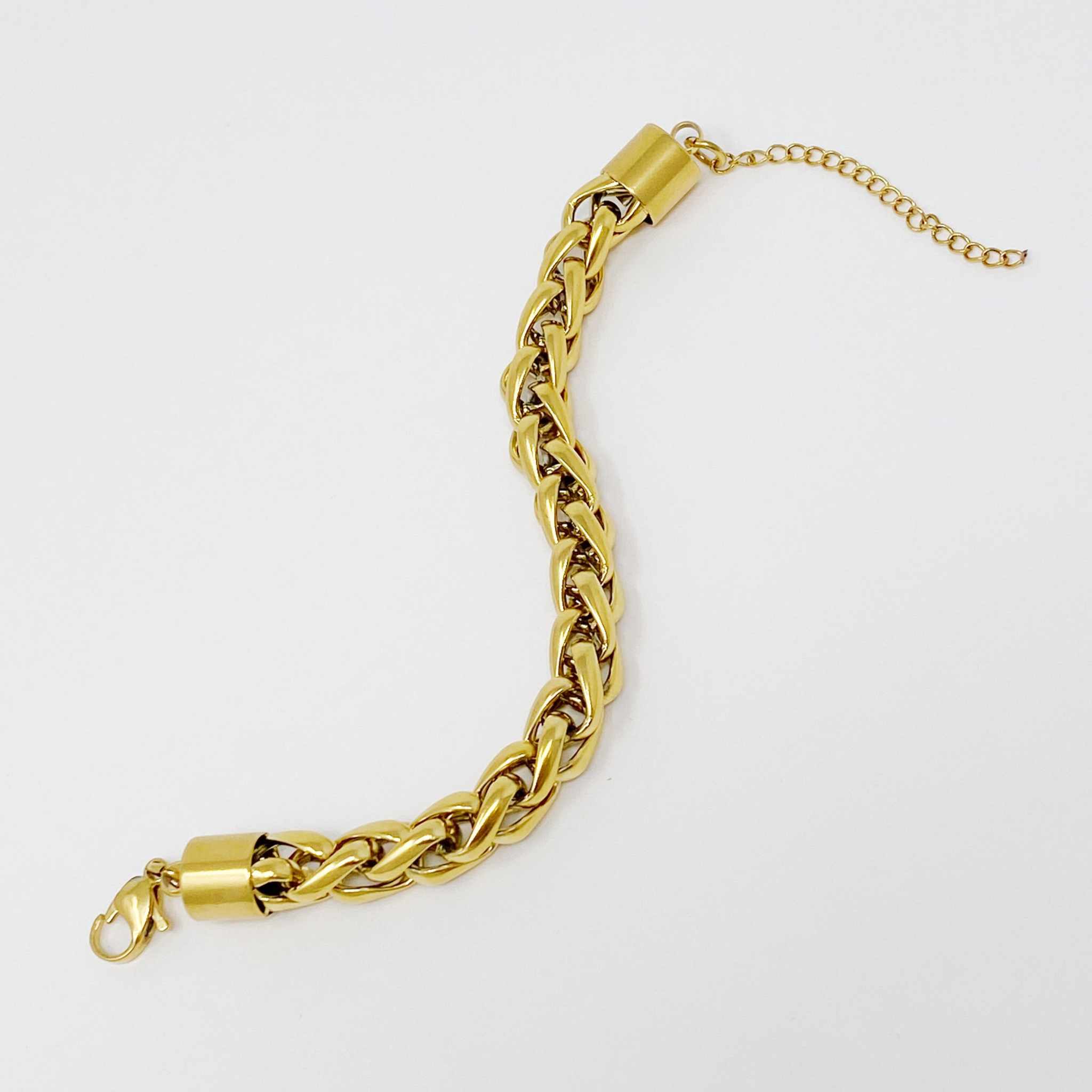 Bold and edgy fashion chain bracelet with small linked design, 18k gold plated stainless steel, 6-inch length with extender.