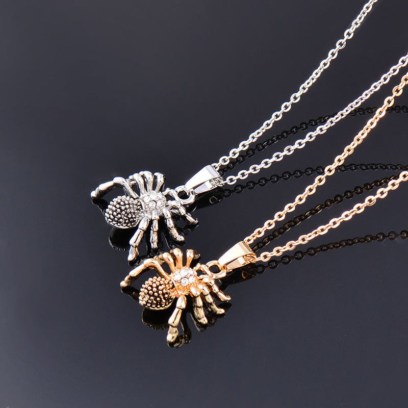 Bold Statement Gothic spider pendant necklace in silver and gold titanium steel with rhinestones