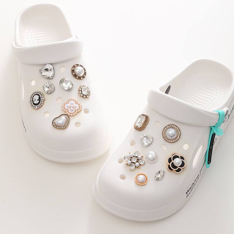 Bright Pearl Flower Shoe Ornament on trendy white clogs, featuring stylish pearl and crystal embellishments.