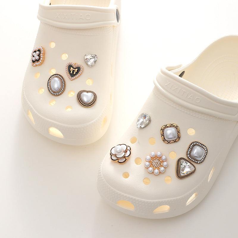 Bright Pearl Flower Shoe Ornament adorning stylish white clogs with elegant pearl and crystal embellishments.