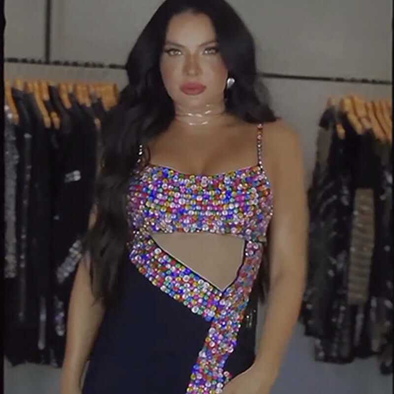 Colorful beaded one-piece dress with cutout design, showcasing bold fashion for women, perfect for night outings.