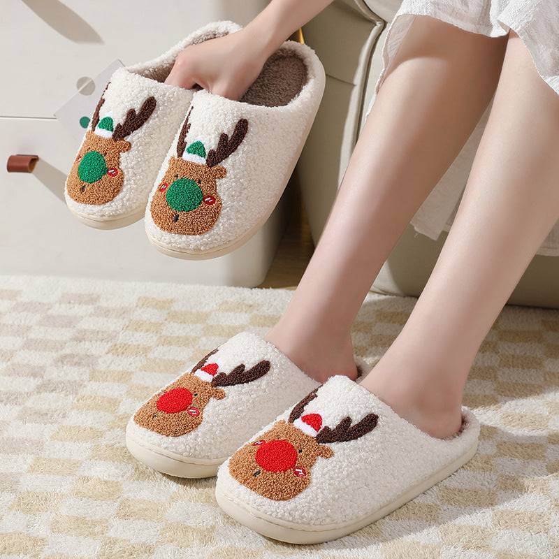 Cozy winter home slippers with plush lining and reindeer design for indoor warmth and comfort