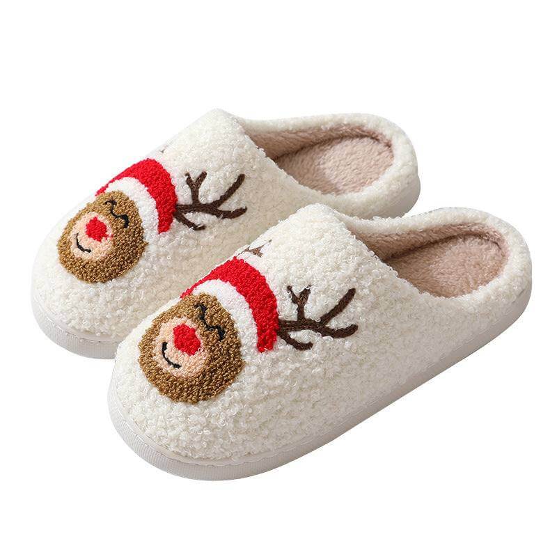Cozy cute cartoon Santa Claus slippers with reindeer design and plush interior