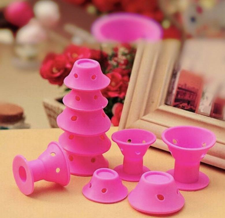 Pink silicone hair curlers for damage-free styling with adjustable curl sizes