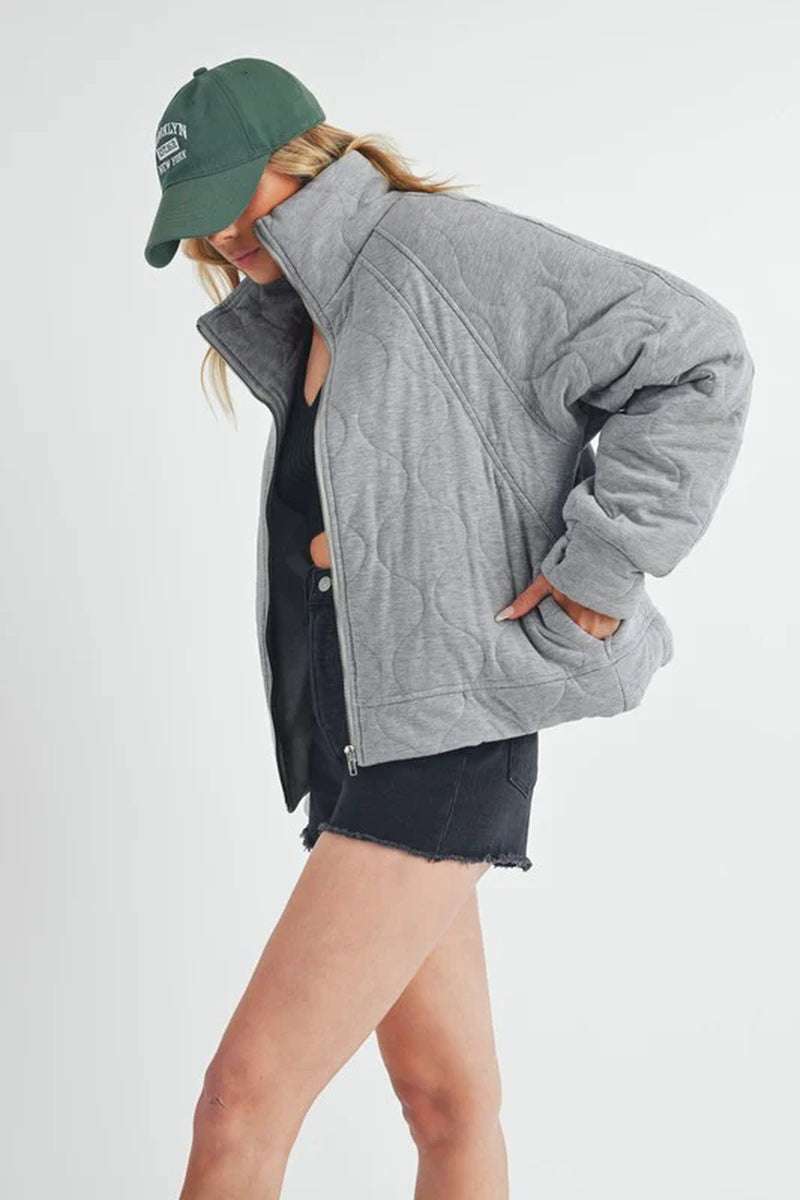 Darla Quilted Jacket in gray, featuring an oversized fit and cozy design, perfect for stylish layering.