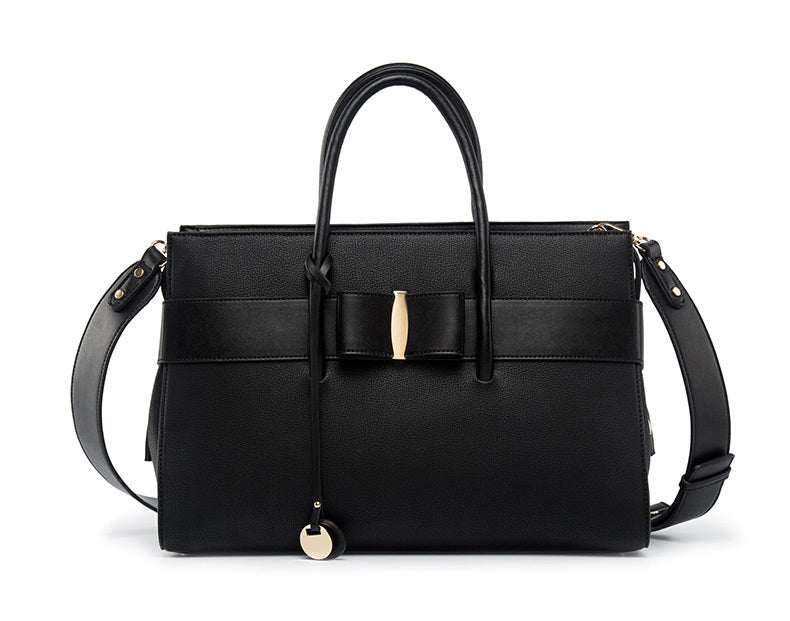 Fashionable computer bag for women made of faux leather with a stylish design.