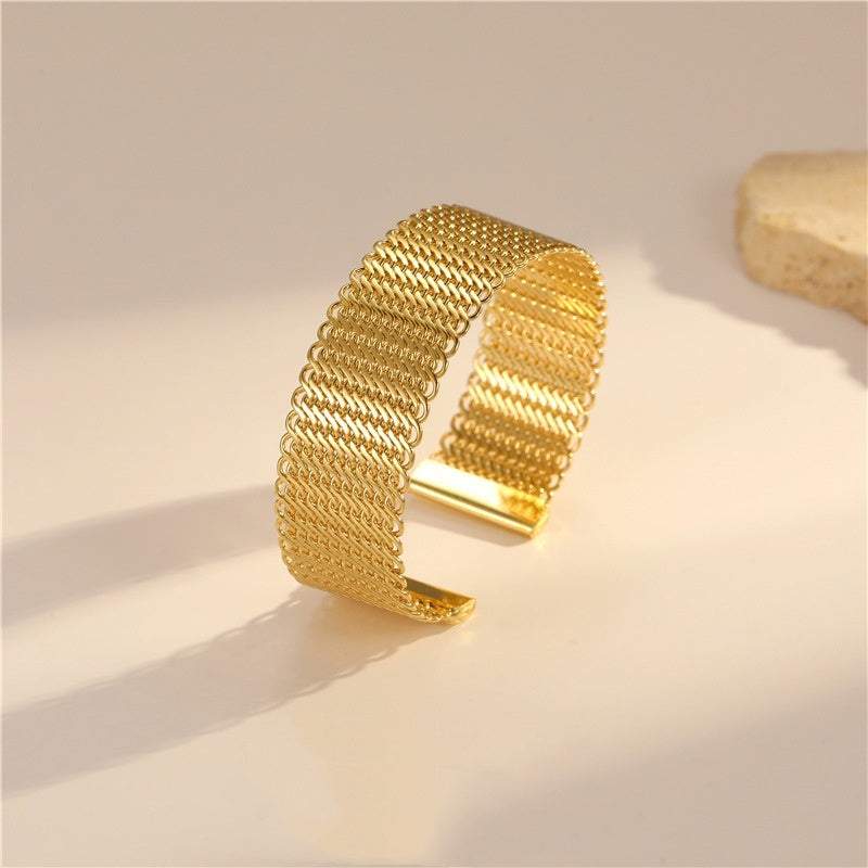European and American style 14K gold open-ended ring bracelet with textured copper design