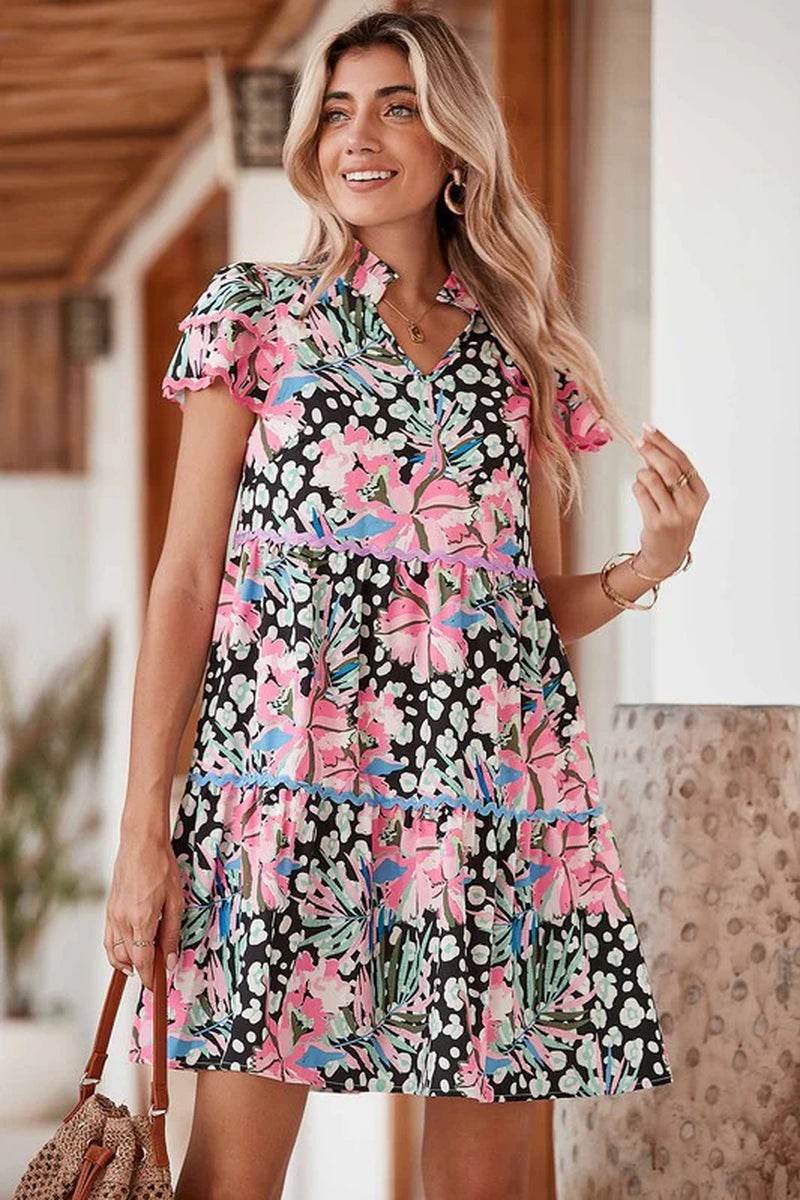 Floral Ricrac Embellished Tiered Mini Dress featuring vibrant prints, short sleeves, and a playful silhouette for warmer weather.