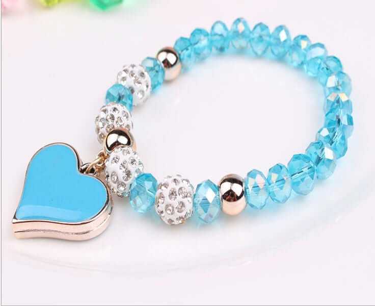 Elegant turquoise heart crystal bracelet with sparkling beads, perfect for stylish accessorizing.
