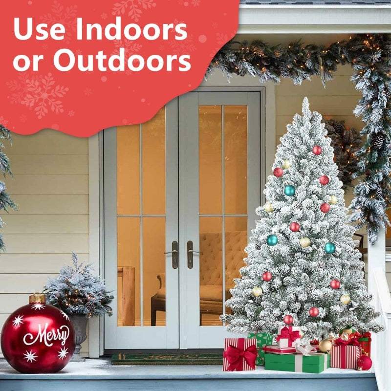 pvc flocked christmas tree displayed outdoors with decorations, showcasing use indoors or outdoors.