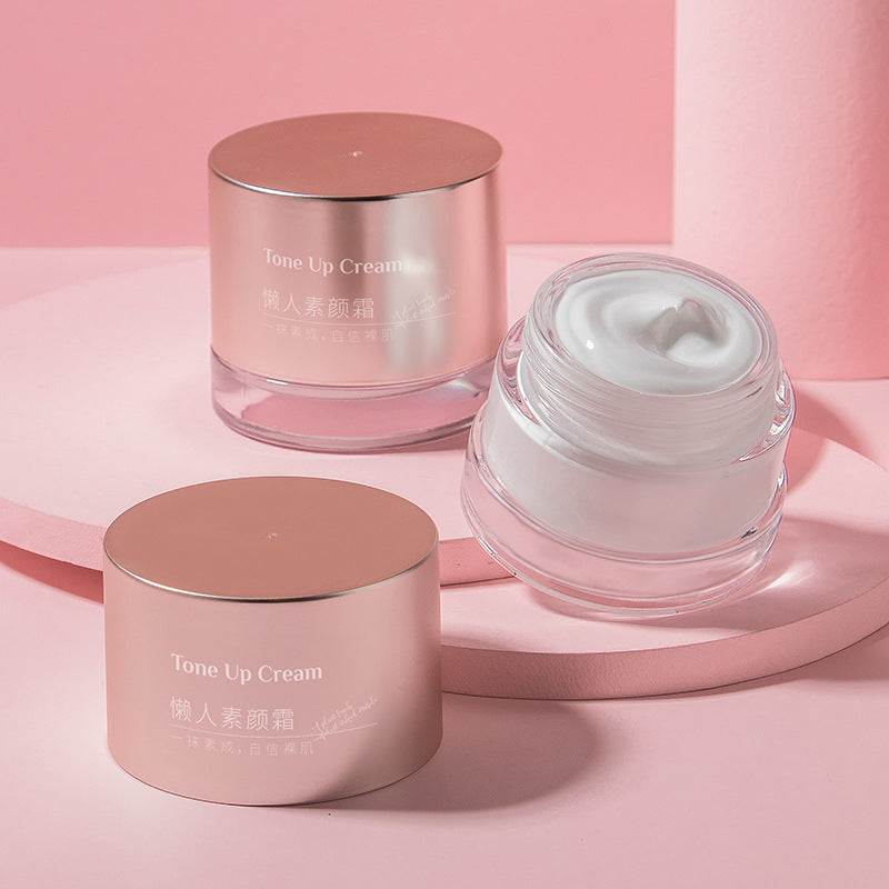 Intense Moisturizing Natural Core Cream in pink jars with white moisturizing cream inside on pink background
