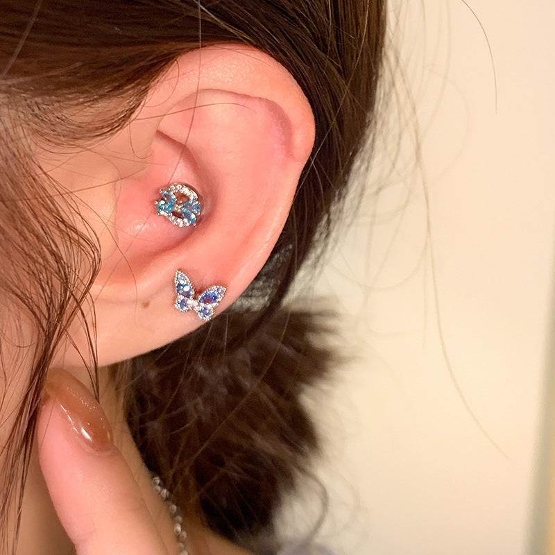 Light luxury minority high-grade super zircon heart-shaped earrings in ocean blue on female ear