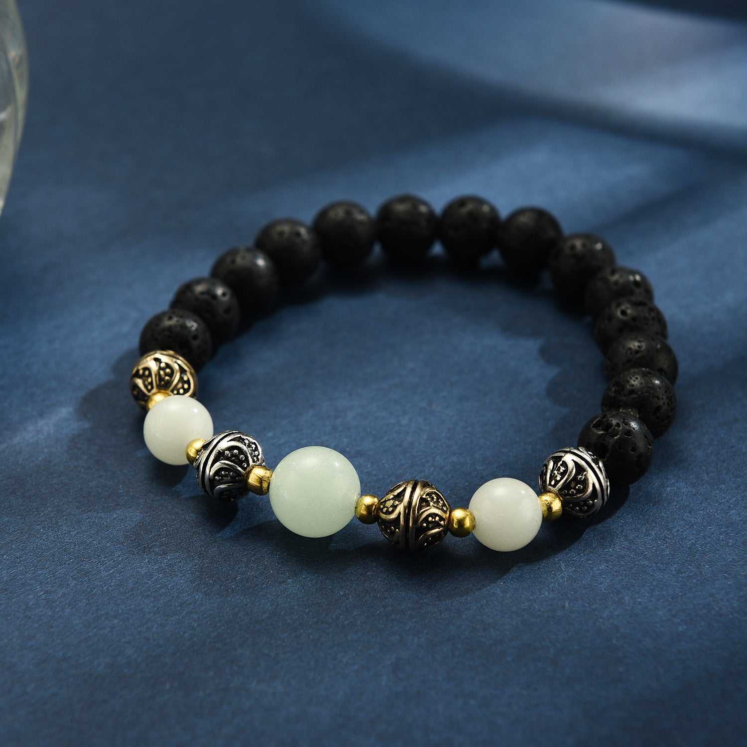 Luminous beaded bracelet for women with black volcanic and fluorescent stones on elastic rope