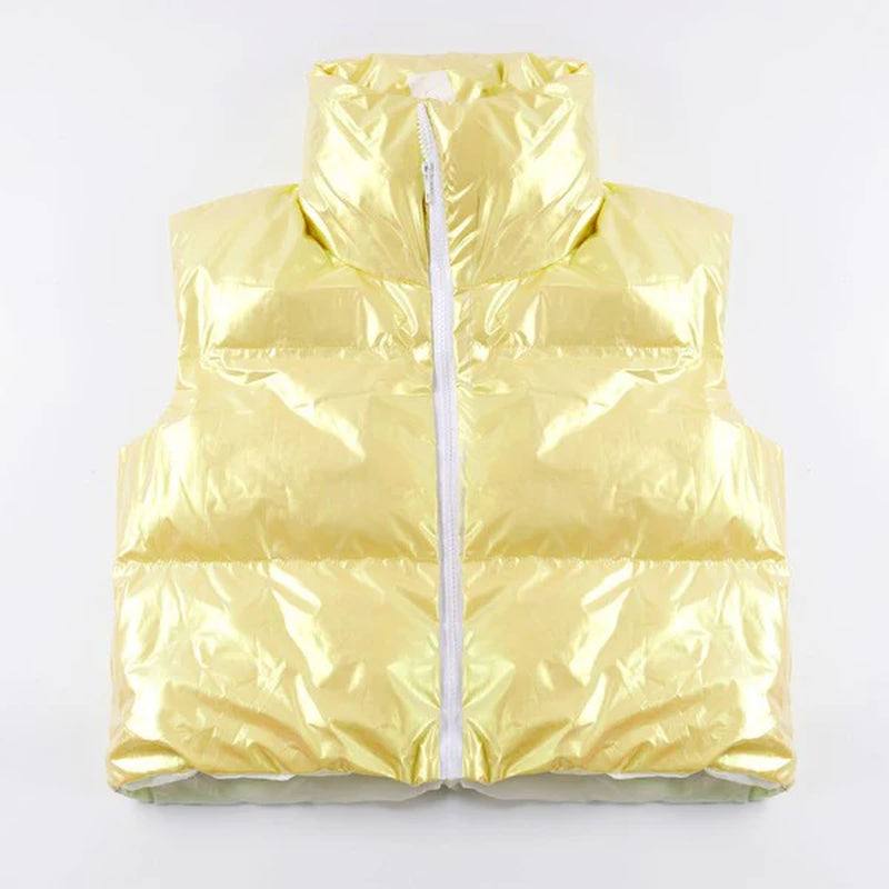 Metallic puffer vest in shiny yellow with mock neck and cropped design, made from 100% polyester.