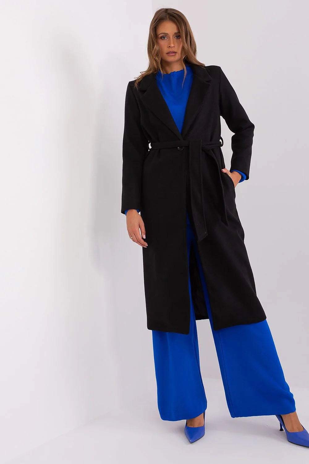 Model wearing Och Bella Classic Belted Wool Coat, styled with a blue outfit, showcasing its elegant design.