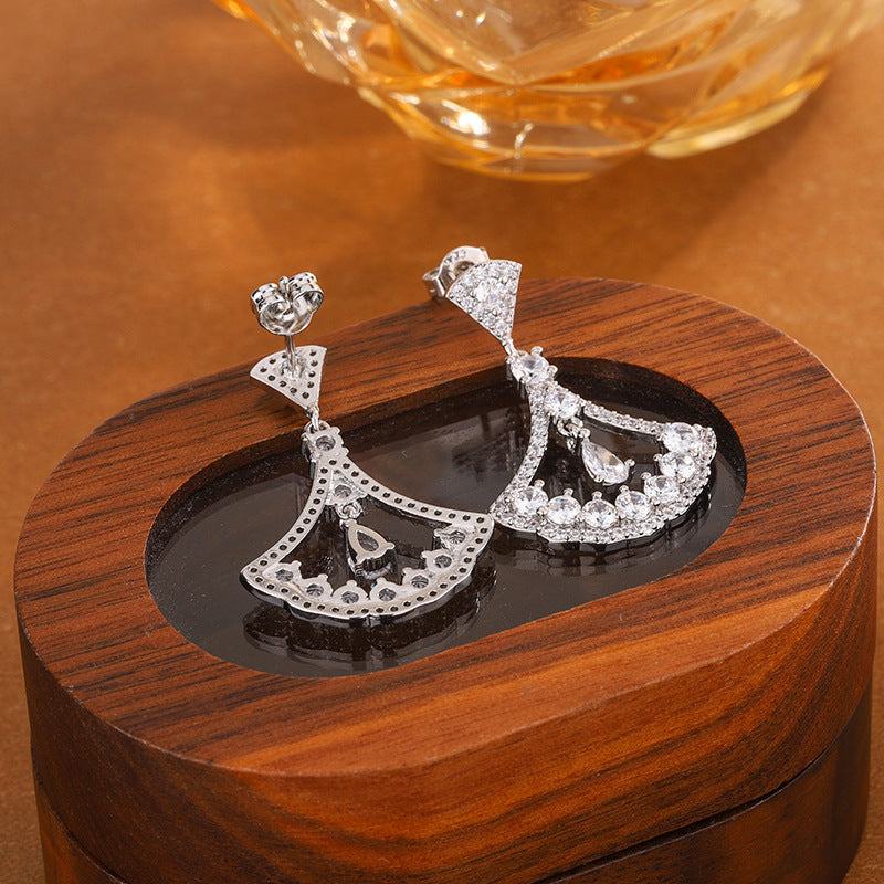 Palace vintage water drop 5A zircon scallop earrings on wooden display