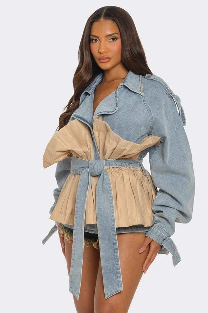 Pleated contrast denim jacket with oversized fit and beige panel, featuring a cinched waist and playful silhouette.