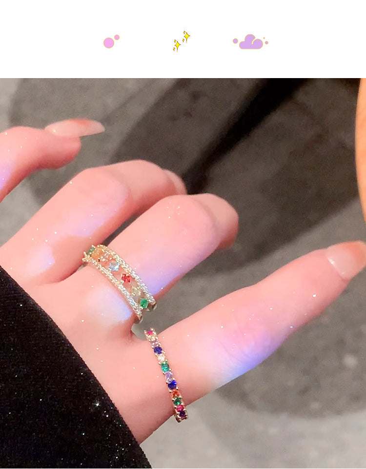 Adjustable rainbow gemstone ring with multicolor zircon stones on female hand