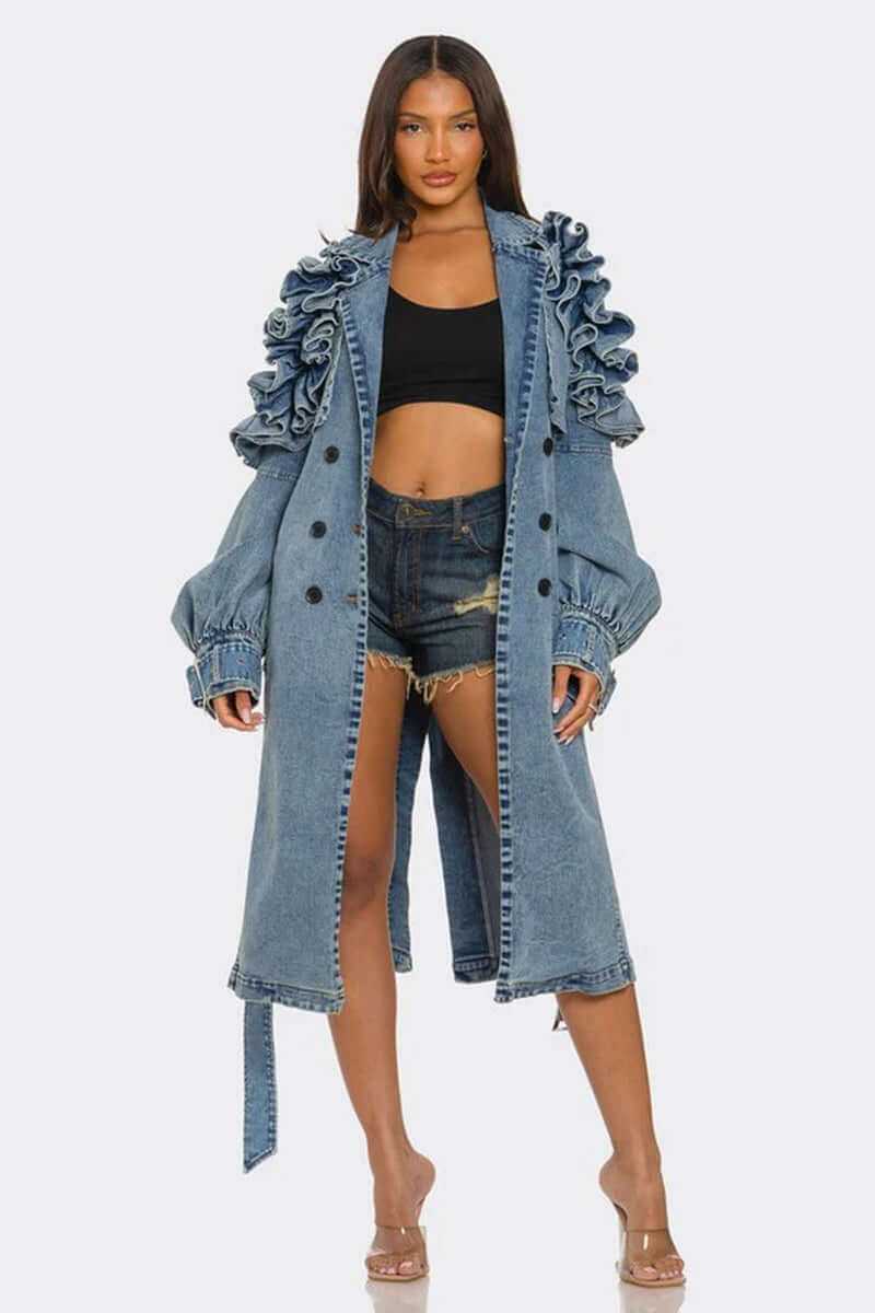 Woman wearing stylish ruffled edge denim trench coat with balloon sleeves and belted waist.