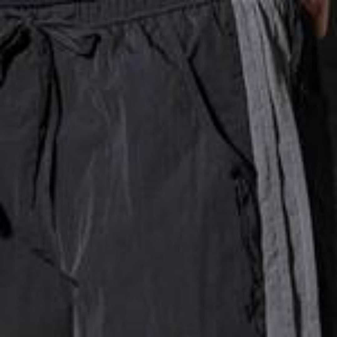 black trendy casual pants for men with gray side stripe and drawstring waistband