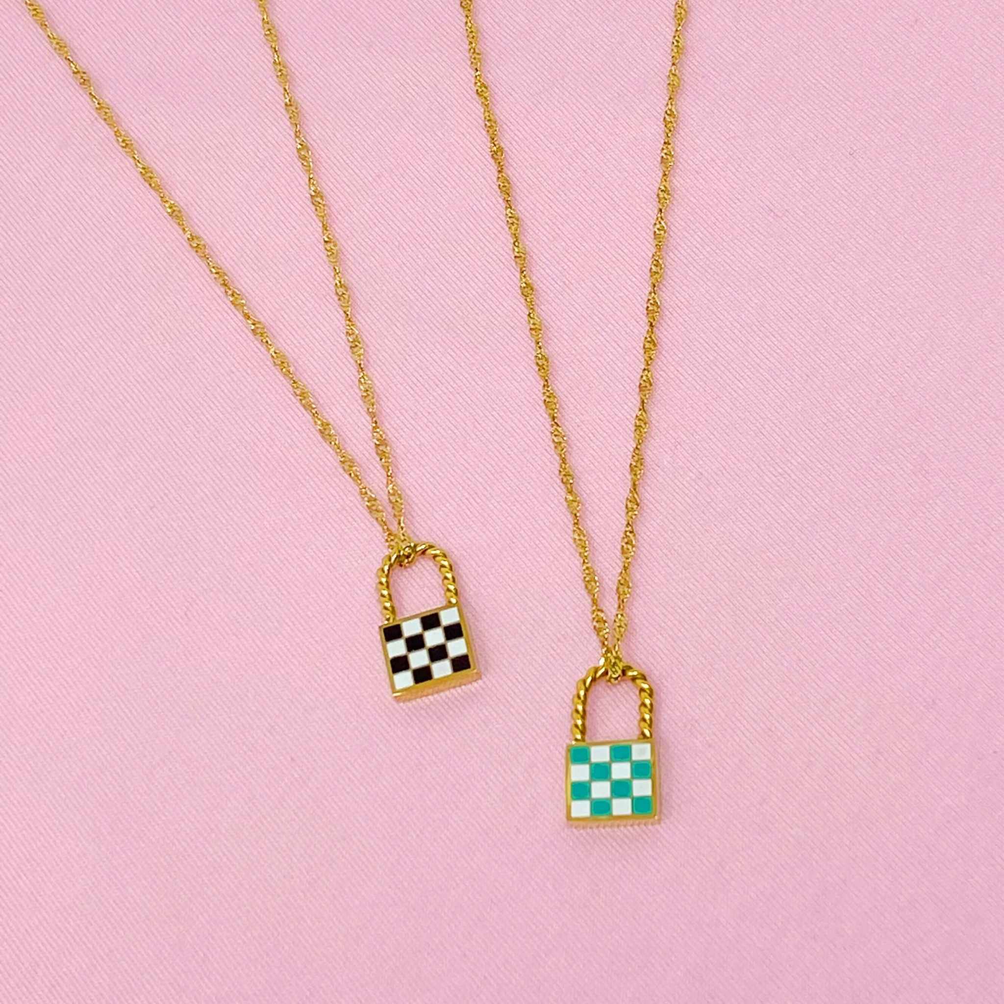 Trendy vintage checkered locket pendant necklaces in gold chains featuring black and turquoise designs.