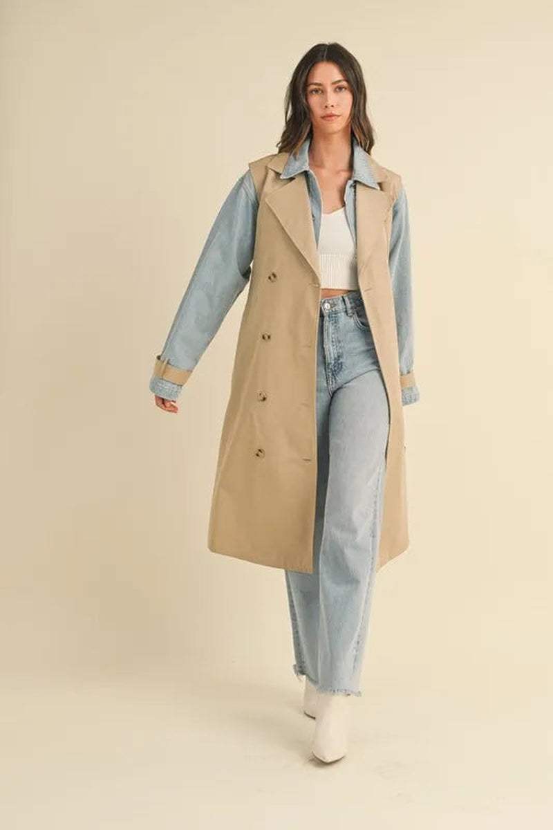 Model wearing a Two-In-One MABLE Layered Trench Coat with Denim, styled with jeans and a crop top.