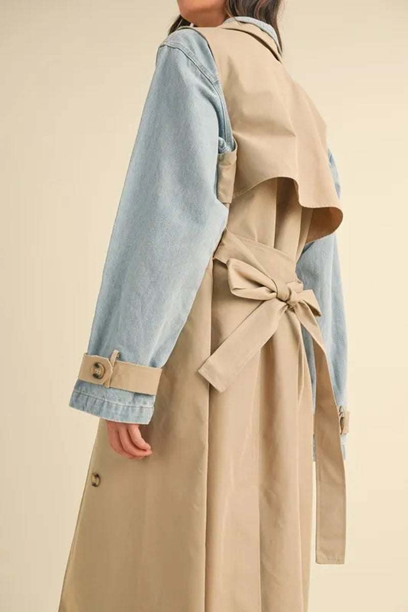 Model showcasing the Two-In-One MABLE Layered Trench Coat with Denim, highlighting its stylish design and functionality.