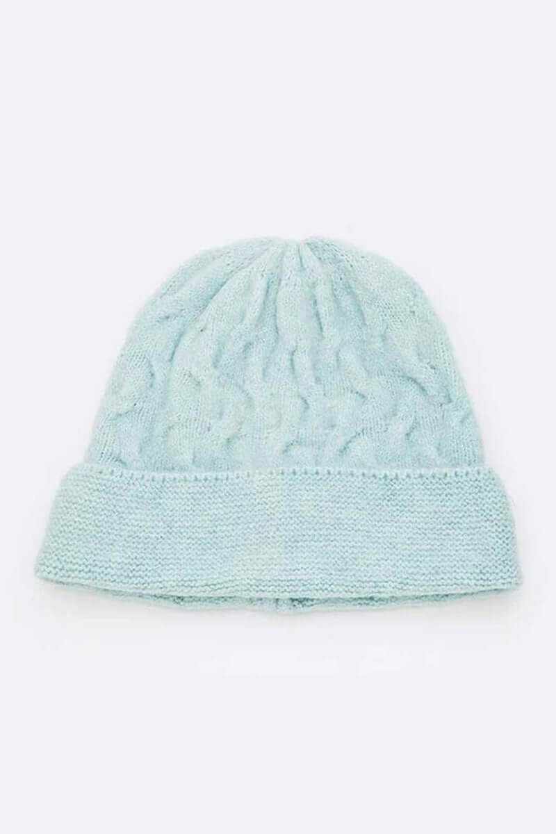 Soft knit slouchy beanie in light blue, perfect for cozy winter style for both men and women.