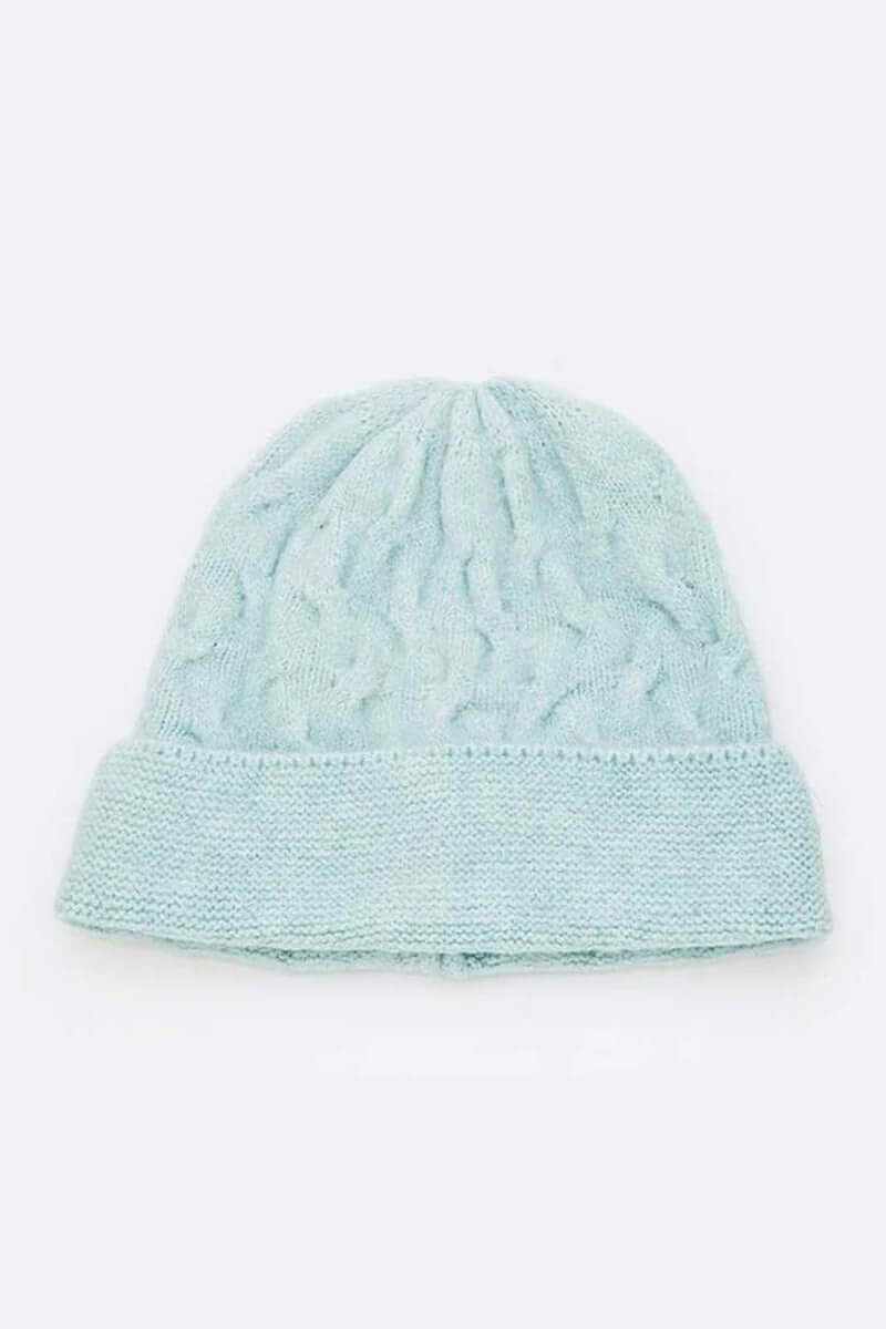 Light blue warm slouchy wool blend cuffed beanie with a textured pattern for winter fashion.