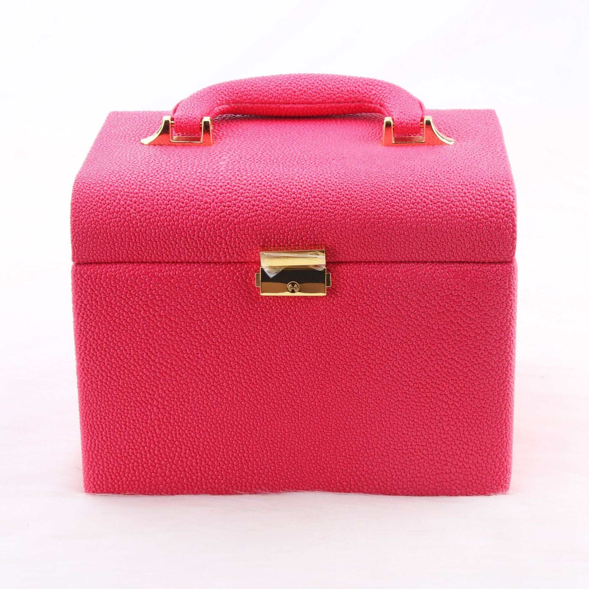 Rose red water-resistant outdoor makeup case with gold lock and handle