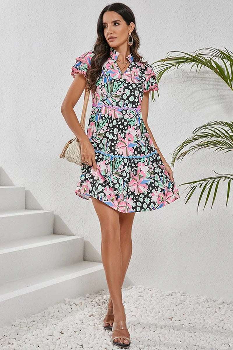 Women floral ricrac embellished tiered mini dress in vibrant colors and short sleeves, perfect for warm weather.