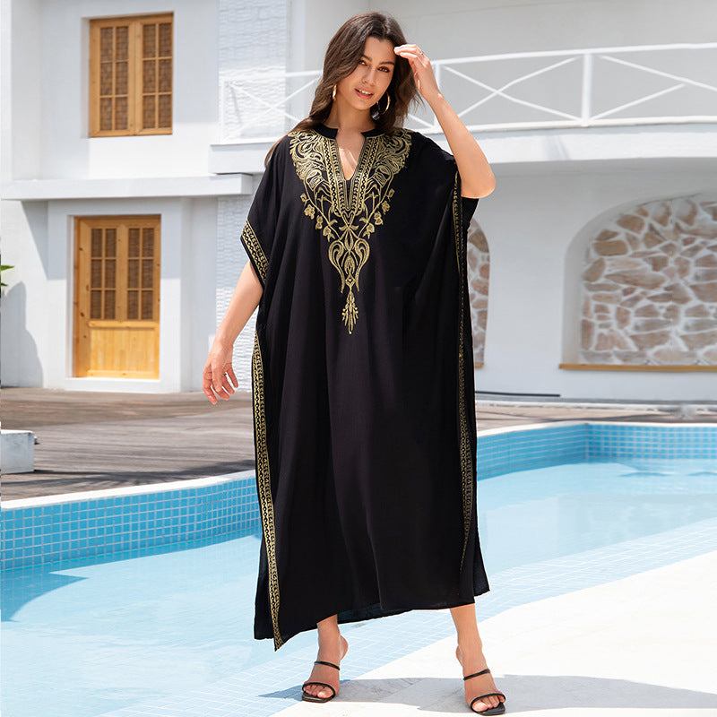 Women’s Embroidered Rayon Cover-Up in black, featuring intricate gold embroidery, perfect for beach and poolside wear.