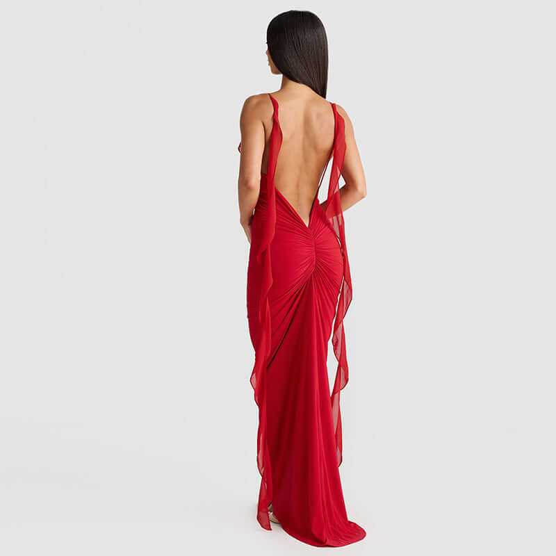 Back view of woman wearing red fashion suspender dress women's clothing