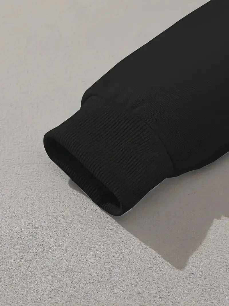 close-up of black women's polyester spandex hoodie sleeve with ribbed cuff