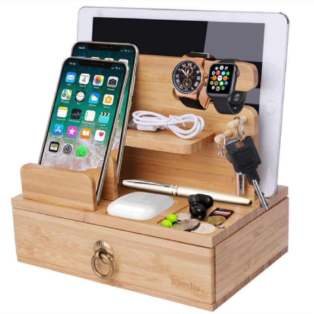Wooden phone accessory organizer with compartments for phones, watches, cables, and keys, featuring a sleek design.
